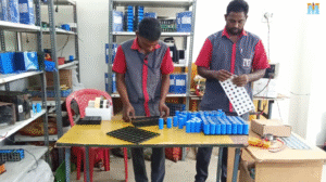 Students assembling EV lithium batteries